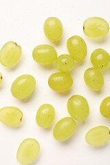 Naklejka premium Fresh ripe grapes on white background, flat lay
