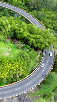 La Estampilla Horseshoe Viaduct near Manizales, Colombia. Establishing Shot. Aerial View. Vertical Video.