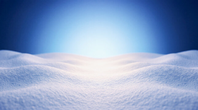 Minimal winter close-up of undulating snow waves under a deep blue sky with bright central light, ethereal backlighting, ideal background for compositions with copy space.