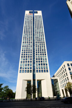 Frankfurt, Germany October 3 2026: Full vertical view of the Opernturm skyscraper with UBS logo against a clear blue sky on Opernplatz in Frankfurt, Germany