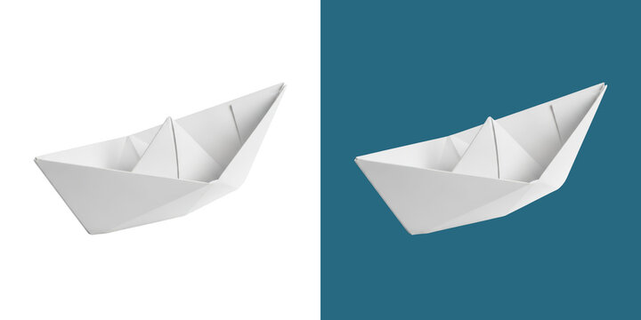 A single simple white paper boat folded from craft paper for creative projects