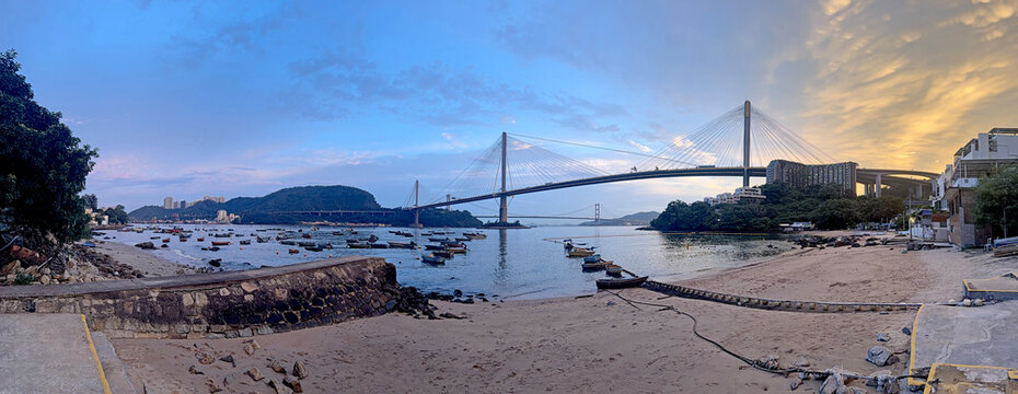 Panoramic view of the Ting Kau Bridge and Tsing Ma Bridge at sunset in Hong Kong coastal scenery