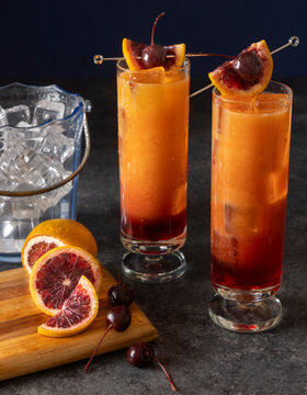 2 layered tall orange cocktails on ice