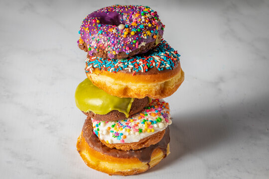 Stack of doughnuts with sprinkles