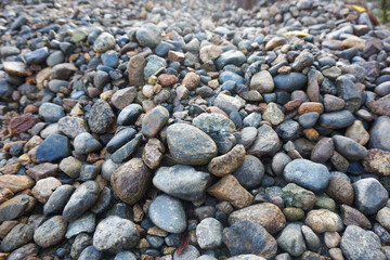 Pile of Smooth River Rocks and Pebbles in Various Colors and Sizes. © Jajar