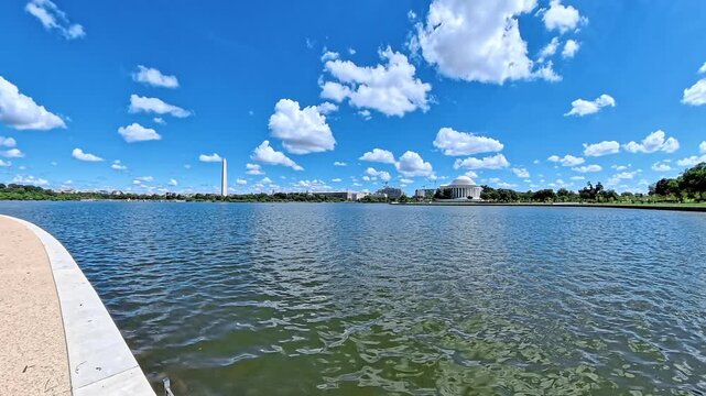 Jefferson Memorial and Washington Monument share a broad waterfront view across the basin.