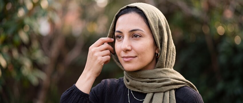 Muslim woman wearing hijab, cultural identity and everyday life