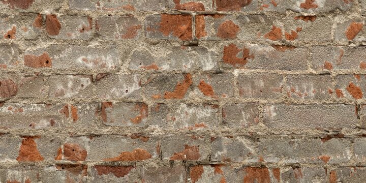 Damaged Red Brick Wall With Cracked Plaster