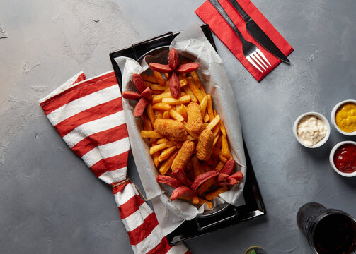 Fried Sausages and Fried Cheese combo with French Fries top view