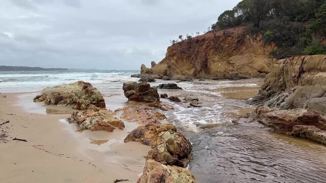 Turbid muddy cloudy water flowing into the ocean after heavy rainfall loaded with nutrients for fish and sharks