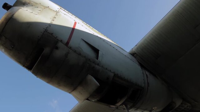 Close Up Low Angle View of Stripped Engine Nacelle on Retired Military Airplane - 4K