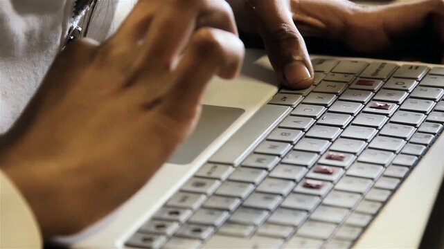 Close Up Shot of Visually Impaired Person Typing on Laptop with Tactile Markers - 4K