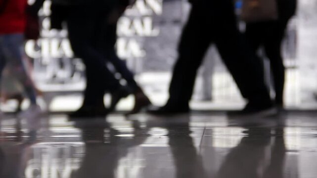 Low Angle Shot of Travelers Legs and Luggage Walking in Roma Termini Station - 4K