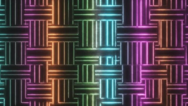 Glowing neon lines weaving pattern video footage featuring vibrant changing colors in dynamic motion graphics animation