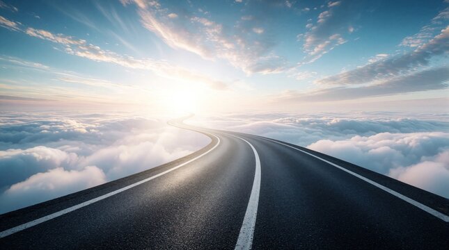 Empty asphalt road winds through soft white clouds toward bright sun on horizon. Winding highway stretches into blue sky representing freedom, future success, endless travel possibilities. Dreamy