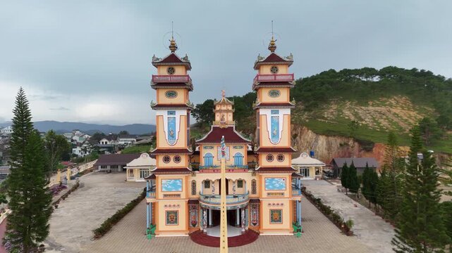 Pull back aerial view of Cao Dai Temple of Da Lat, Dalat, Lam Dong, Vietnam.