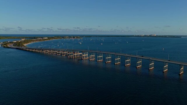 Bridge Rickenbacker Causeway on Biscayne Bay in Florida. Rickenbacker Causeway Bridge. Aerial view of Rickenbacker Causeway bridge over Miami with urban traffic, 4k footage