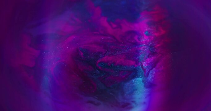 Glitter spill. Blur flare paint. Shimmering pigment stream blend colorful neon glow. Purple pink blue abstract shiny liquid background.