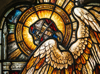Fototapeta premium Colorful Stained Glass Artwork Depicting Praying Holy Angel