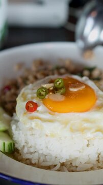 Thai Minced Pork Holy Basil Pad Krapow with Fried Egg on Steamed Rice