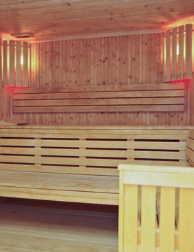 Finnish or dry sauna with oceanview or view of the sea inside male locker room of spa or wellness are onboard luxury cruiseship or cruise ship liner