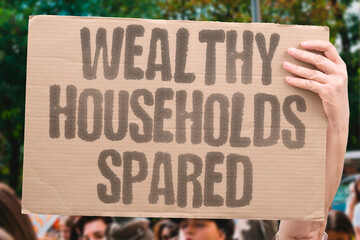 "Wealthy households spared" Critics say tax policies shield the richest families. TAXES. WEALTHY. HOUSEHOLDS. CRITICS. POLICY. © AndriiKoval