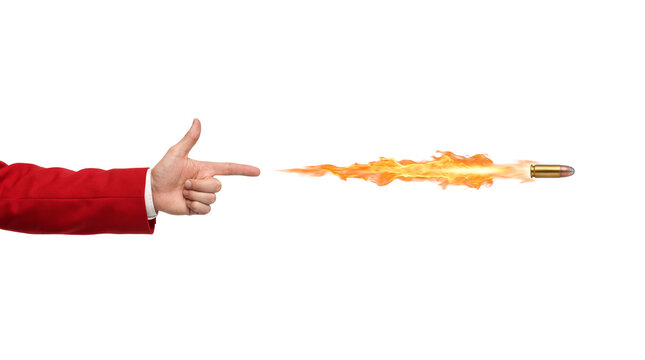 Hand in red suit making finger gun gesture shooting a flaming bullet isolated on white background