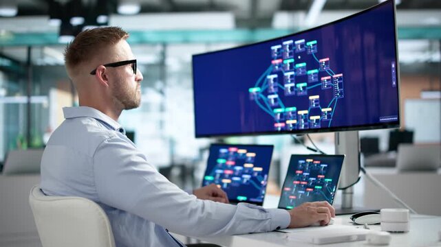 Software Engineer Is Using A Laptop
