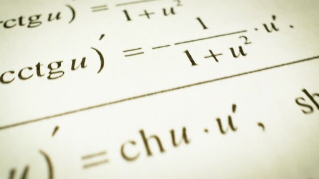 Flyover across mathematical differentiation formulas on a printed book page