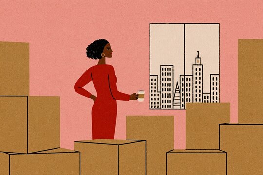 woman starting over again standing in a room filled with cardboard boxes holding coffee looking at the city view from her new office or appartment