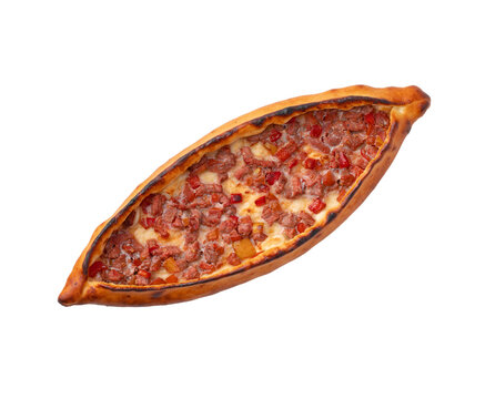 Traditional Turkish pide with ground meat and peppers served on a white background