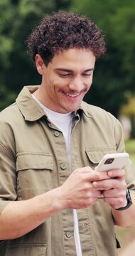 Student, man and laugh in college with phone, internet joke and funny relatable meme for education. Happy, person and typing outdoor in university with tech, text message and humor on social media.