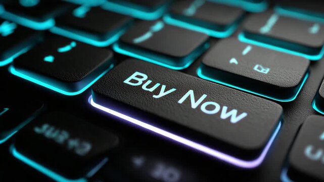Close up of a computer keyboard showing the buy now button illuminated in colorful light