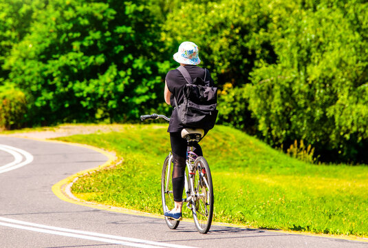 Cyclist ride on the bike path in the city Park
