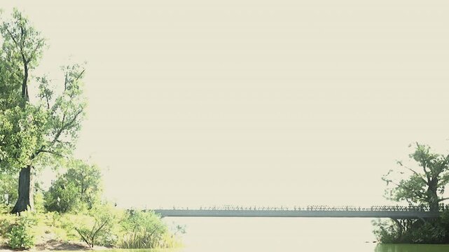 A large group of people strolls across a bridge, enjoying the sunny weather. The vibrant green trees create a serene backdrop, adding life to the scene.