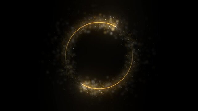 Gold glitter particle ring turns on pure black while two bright sparkler heads chase each other around the circle trailing light and scattering dust outward with an open center for a logo