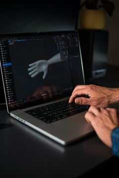 3D Modeling on Laptop with Hands Typing