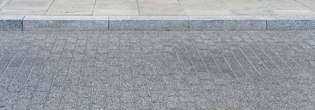 Concrete road curb on pavement road