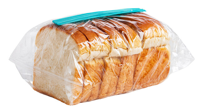 Sliced white sandwich bread loaf in a clear plastic bag with a blue plastic clip