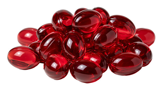Shiny red translucent gel capsules piled in a heap