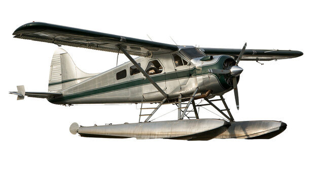 Vintage silver and green single engine seaplane with floats