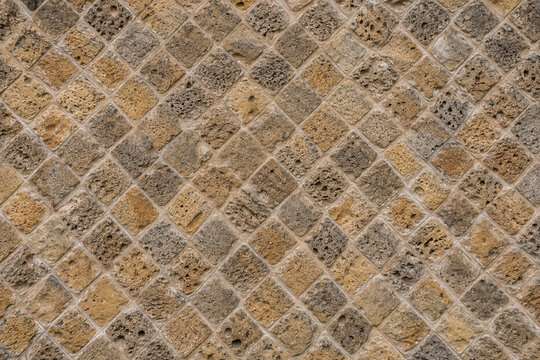 Opus reticulatum pattern, Roman stone wall, architecture background