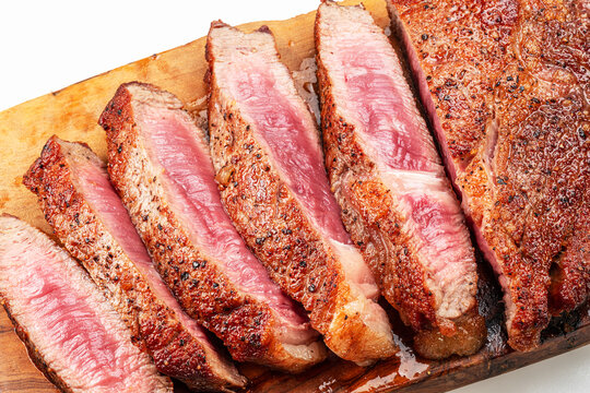 Sliced grilled beef ribeye steak medium rare