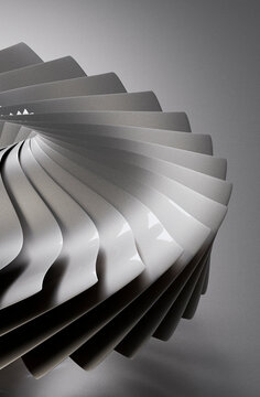 Abstract curved spiral sculpture in gray tones