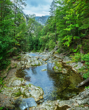 Top down panoramic view of crystal clear turquoise river flowing through Otschergraben (Oetschergraeben) canyon in september, Austria