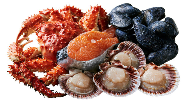 Fresh king crab salmon steak, raw scallops and black mussels seafood platter