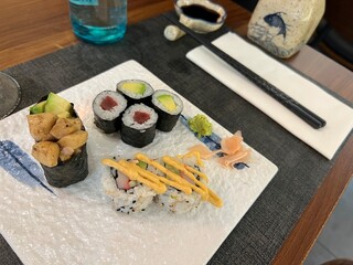 Photo of assorted sushi plate with maki and uramaki in a restaurant © Bat-seba