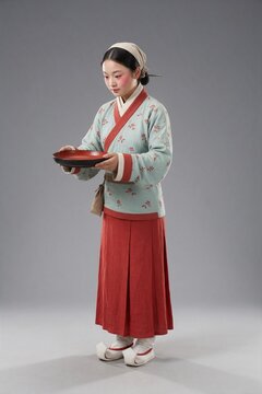 Chinese Qin Dynasty Bondswoman in Embroidered Robe and Silk Shoes