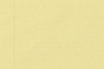 Yellow legal pad paper with ruled lines © ibreakstock