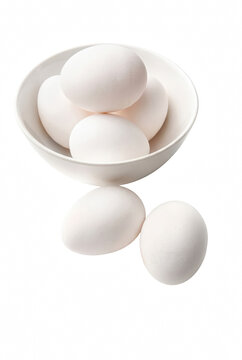 Fresh White Eggs in a White Ceramic Bowl